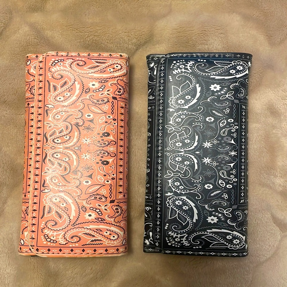2 Wallets. Black NWOT - Pink Gently Used.